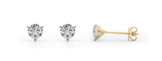 Pair of .75ct diamond stud earrings with  yellow gold prongs on a white background- showing the 3 prong front view and showing the push back side view